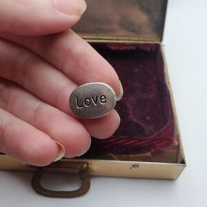 Love charm pendant‎